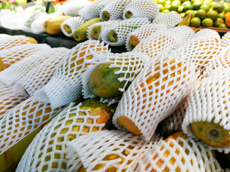 Fresh ripe holland papaya on a stall for sell at fruit market,Papaya fruitの写真素材