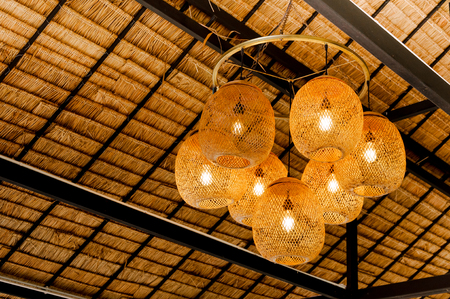 Decorating hanging lantern lamps in wooden wicker made from bamboo,interior decorationの写真素材