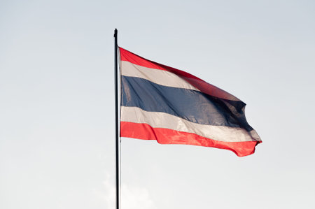 Thailand flag on  top of the pole in a windy day dusk