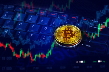 Bitcoin coins on trading graph of chart diagram,symbol of electronic virtual money and mining...