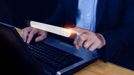 Businessman touching data search box information technology Search Engine Optimization. uses a search box to search for information on the Internet.の写真素材
