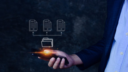 Document Management System (DMS) on smartphone, Online documentation database process automation to efficiently manage files, knowledge and documentation enterprise with ERP. Corporate business technology.の写真素材