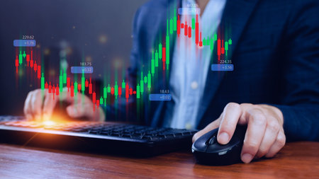 Hand of businessman or trader is showing growing virtual hologram stock, planning and strategy,...