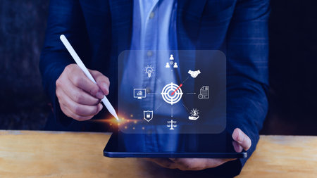 Hand pointing the icon virtual screen of Digital target marketing advertising and sales increase business technology concept, online marketing, E-business, Ecommerce, Business online.の写真素材