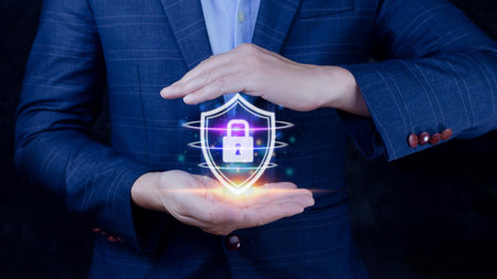 Computer network protection, secure and safe your data concept, businessman holding shield...