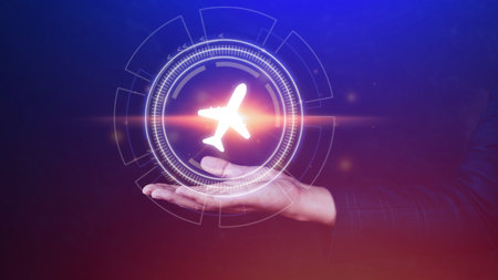 Businessman holding an plane airplane icon in his hands. Online ticket purchase.Travel icons about travel planning, transportation, hotel, flight and passport.Flight ticket booking concept.の写真素材