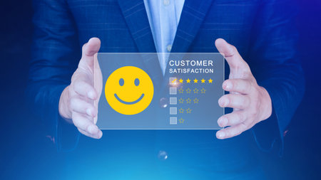 User gives rating to service experience on online application, Customer review satisfaction feedback survey concept, Customer can evaluate quality of service leading to reputation ranking of business.の写真素材