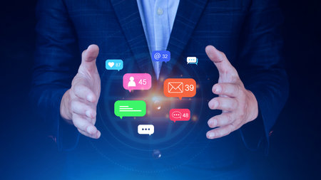 People using social media and digital online marketing concepts with icons such as notifications, messages, comments on the screen.の写真素材