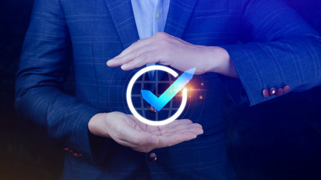 Quality Assurance Control Standards, Hand shows the sign of the top service Quality assurance, Guarantee, Standards, ISO certification and standardization concept.の写真素材