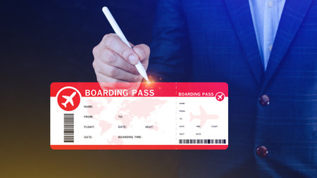 Hand holding boarding pass tickets air travel concept, Choosing checking electronic flight ticket.の写真素材
