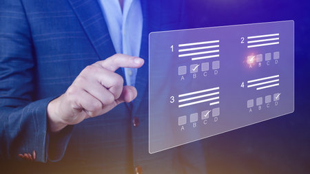 Online exam concept, choose correct answer in test. checklist and online testing. online exam test. online questionnaire results on desktop. quiz.の写真素材