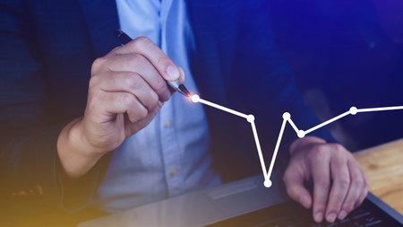 Businessman drawing growth curve, growth forecast chart, bussiness success concept. Hand drawing a...