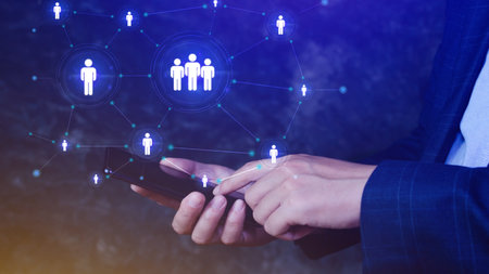 Human resources, HR management, employment, headhunting concept, Businessman pressing modern social buttons on smartphone virtual backgroundの写真素材