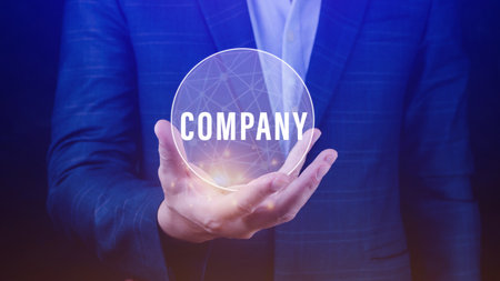 Businessman holding button company on virtual screens, business, technology, internet and networking concept.の写真素材