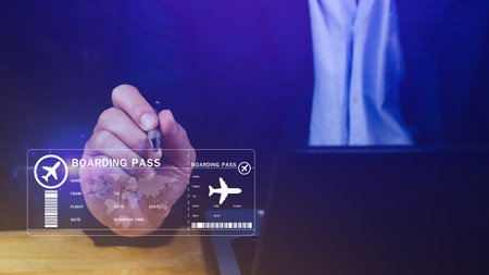 Businessman touching with boarding pass tickets air travel concept, Choosing checking electronic flight ticket, Booking ticket Online flight travel conceptの写真素材