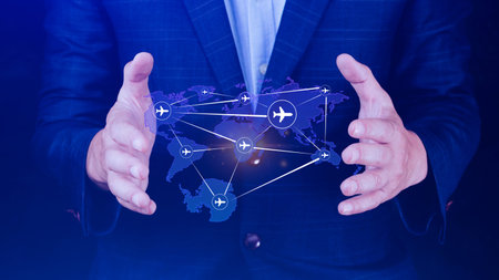 Businessman hand pushing flight booking networking, Hand pressing light blue world map with flight...