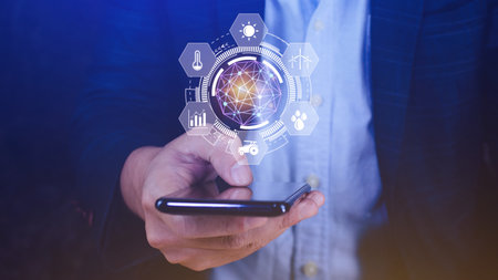 Using hand pressing with infographics smart farming and precision agriculture with visual icon on smartphone, Innovation technology for smart farm system, Agriculture management, smart technology concept modern technology.の写真素材