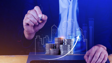 Real estate investment marketing analysis, Stack of coins with graph of business growth, Planning to...
