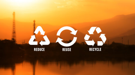 Reduce, reuse, recycle symbol on industry background, ecological metaphor for ecological waste management and sustainable and economical lifestyle.の写真素材