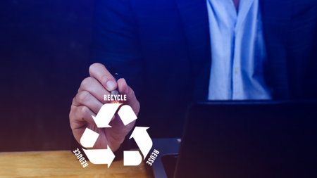 Reduce, reuse, recycle symbol with Using touching virtual touchscreen interface background, ecological metaphor for ecological waste management and sustainable and economical lifestyle.の写真素材