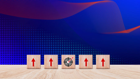 Target concept, objective, virtual target board and rising arrows screen printed on wooden cubes....