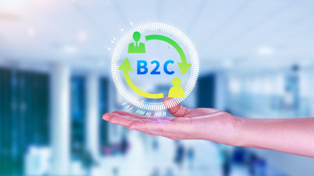 B2C, Business to customer marketing strategy concept. Businessman holding with virtual B2C icon for business strategy, communication, feedback, online marketing, Ecommerce marketing strategy.の写真素材