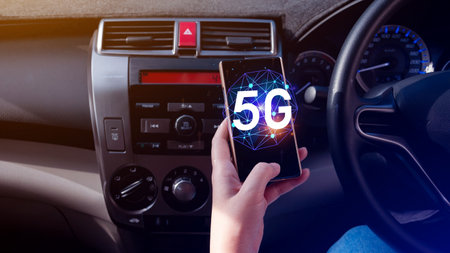 Business using smartphone with holographic 5G network concept, digital globe with interconnected 5G symbols, 5G technology in modern business and communication, digital transformationの写真素材
