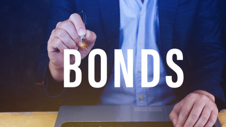 Businessman clicks bonds virtual screen. Bond Finance Banking Technology concept, Trade Market Network, bond security that indicates the investor has provided loan the issuer, Equivalent loan, Unsecured and secured bonds.の写真素材