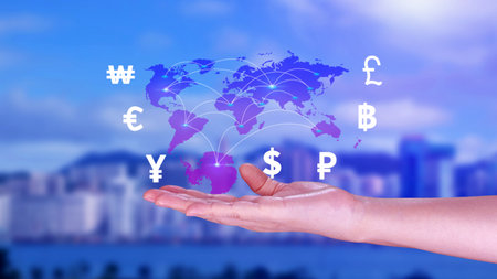 Businessman holding to money transfers and currency exchanges between countries of the world, online banking interbank payment concept.の写真素材
