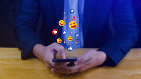 People using social media and online digital concept, Businessman using smart phone sending emojis...