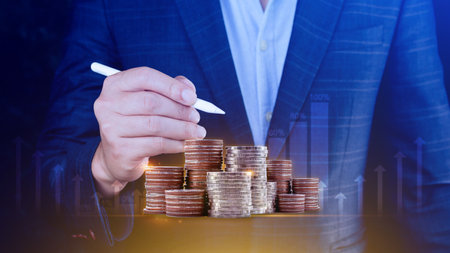 Businessman and stack of coins abstract background, Business concept. Interest Investment ideas, returns, financial returns,savings, investment businesses.の写真素材