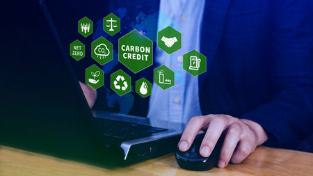 Green energy, Carbon credit market concept, Businessman holding Carbon credit icon, Net zero, Green energy icon. Carbon Neutral in industry Net zero emission eco energy.の写真素材