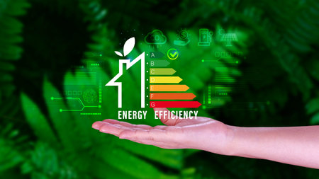 Energy efficiency concept, Businessman touching virtual screen of energy efficiency rating for energy efficient house building rate label audit, Renewable energy concept.の写真素材