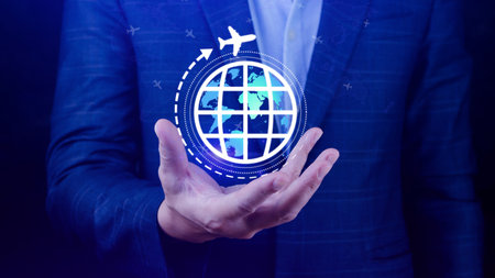 Travel insurance and business travel concepts, Booking airplane tickets on digital app or online travel insurance concept, protective gesture and icon of plane and globe.の写真素材