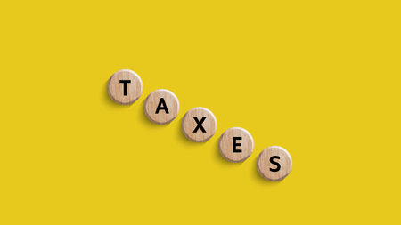Tax concept on wooden cube. Income tax, savings, represent the concept tax return preparation and financial management, taxes planning. Finance, Money, Investment, Finance, Fundsの写真素材