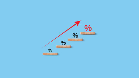 Financial, stocks, interest rate and GDP percent change, wooden block with percentage sign and arrow...