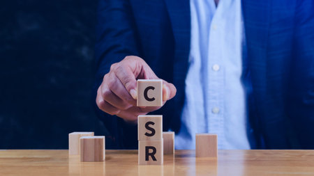 CSR, Corporate Social Responsibility concept, wooden cubes with CSR text, global ecology, responsive...