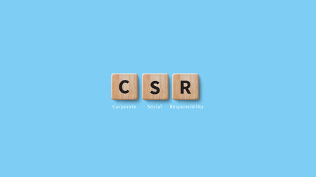 CSR, Corporate Social Responsibility concept, wooden cubes with CSR text, global ecology, responsive...
