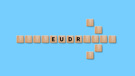 EUDR Environmental Responsibility and drinking coffee in European Union Concept, EU Deforestation Regulation EUDR on wooden cube, Sustainable practices and corporate environmental responsibilityの写真素材