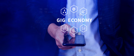 Gig economy. using a smartphone, freelance, hybrid workplace concept. combination of employment trend, growing to external hiring. not aiの写真素材