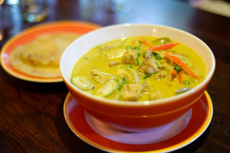 Spicy green curry with chickenの写真素材
