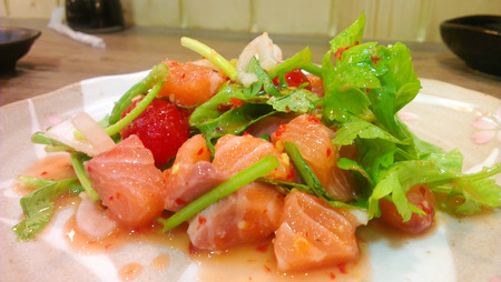 Salmon Sashimi in Spicy Hot Sauceの写真素材