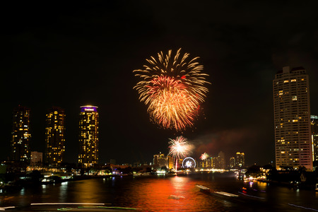 Night light landscape at Taksin bridge with firework,Bangkokのeditorial素材