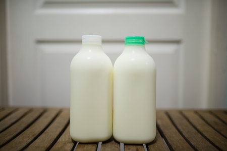 Milk bottle on the wood table