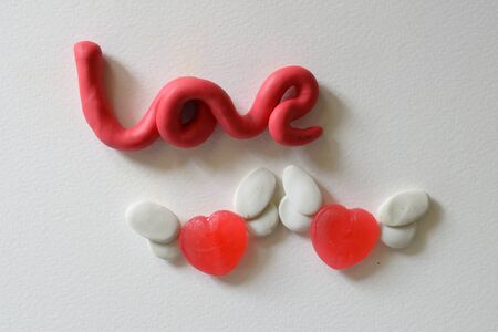 Sweet heart candy flying angel with love letterの写真素材