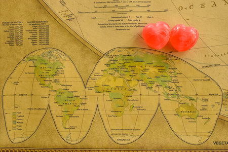 Sweet heart candy present love in old world map