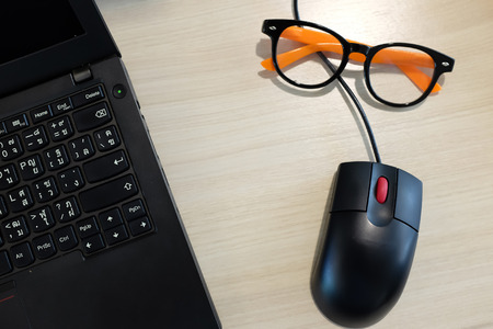 Glasses on table in the officeの写真素材