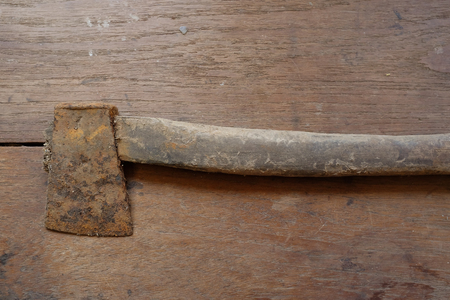 Axe on wooden background.の写真素材