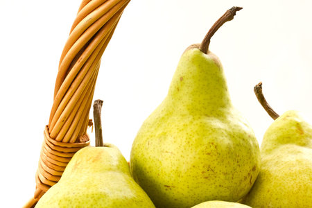 delicious ripe pears in the basketの写真素材