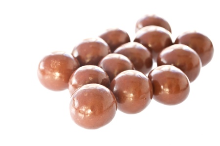 candy, chocolate round on a white backgroundの写真素材